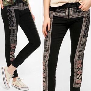 Patterned BDG skinny black washed jeans